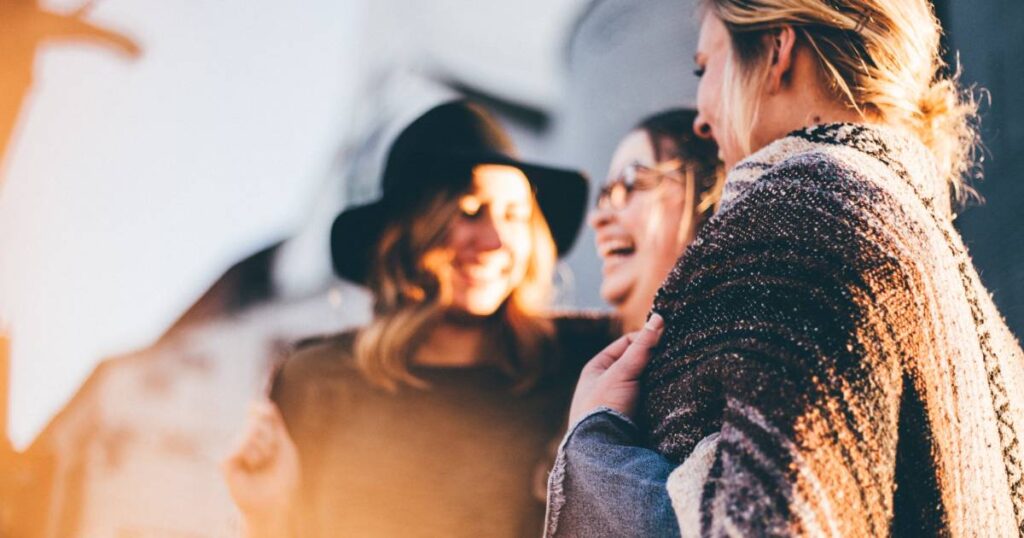 3 women smiling